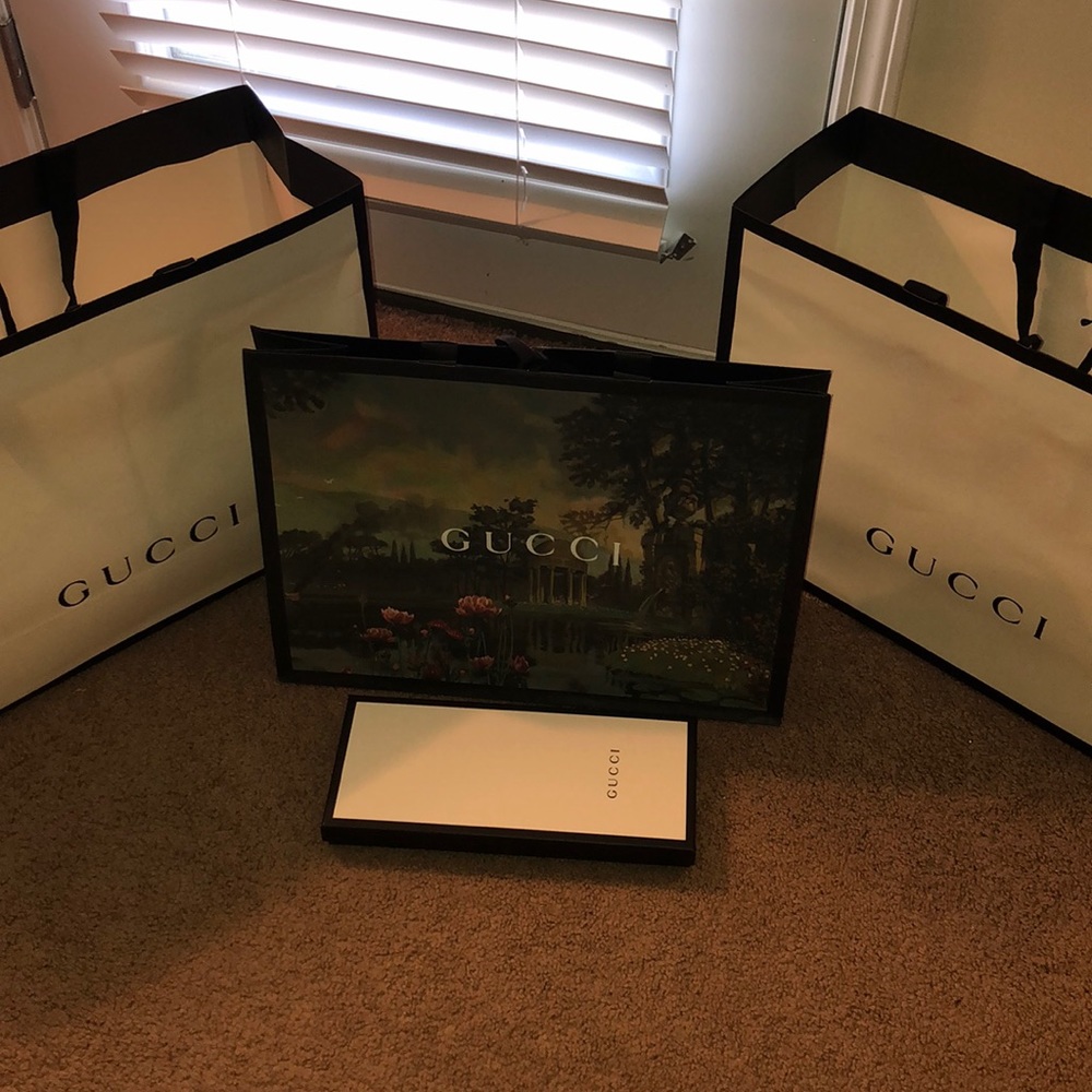 3 Gucci bags and 1 small box
